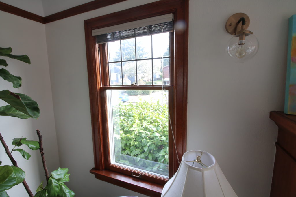 single single pane double hung window with shellac finish and zinc panel in upper sash