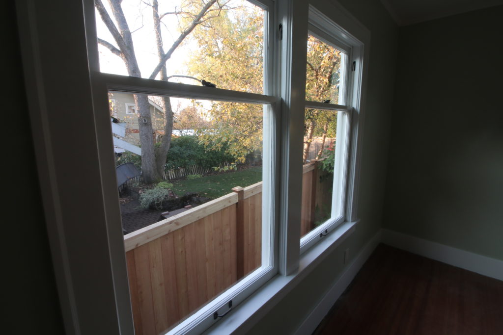 another side angle on two side by side double hung windows that have been fully restored.